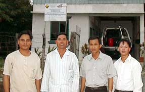 Samkhan Soeur, Chreung Kao, Sarim Um & the animal husbandry trainer at the WRF